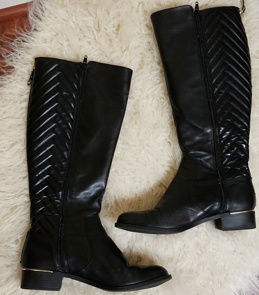 calvin klein black boots with gold zipper